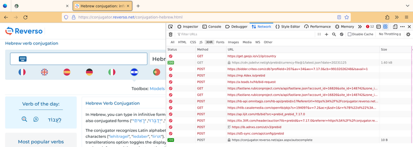 https://reverso.net in Firefox. The network tab shows 12 suspicious requests blocked (and 2 legitimate requests).