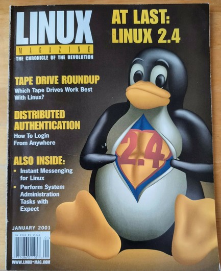 Linux magazine January 2001. Tux with muscles in the cover 